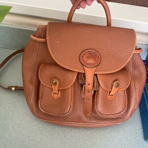 Beautiful used vintage Dooney & Bourke Tan Backpack leather Bag